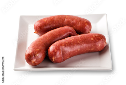 Sausages appetizing on a white plate
