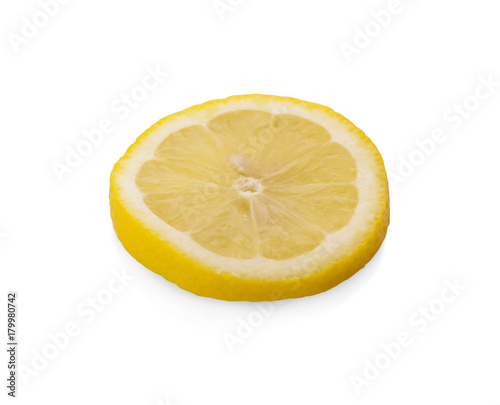Top view of textured ripe slice of lemon citrus fruit isolated on white background.