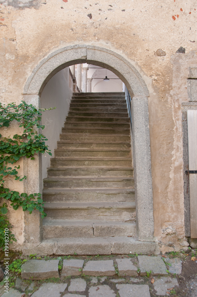 castle door with stairs