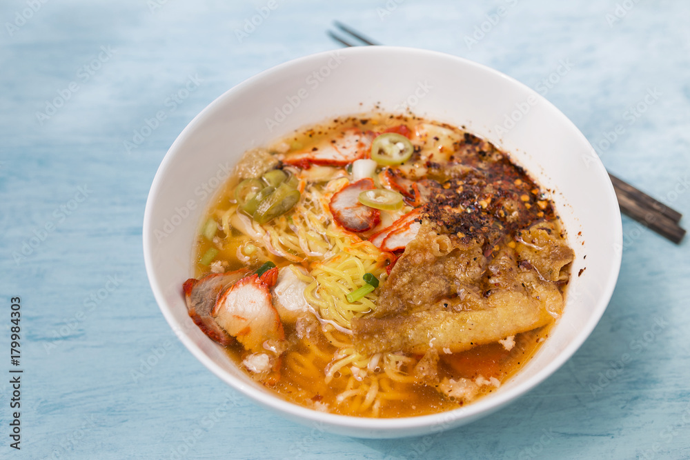 Egg noodle soup with roasted pork