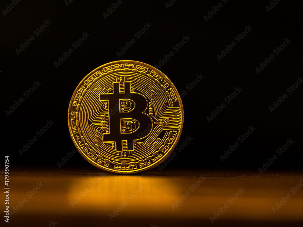 Golden bitcoin cryptocurrency banking money transfer business technology with black background. Concept of distributed ledger technology and digital electronic binary money financial. Golden bitcoin cryptocurrency banking money transfer business technology with black background. Concept of distributed ledger technology and digital electronic binary money financial.