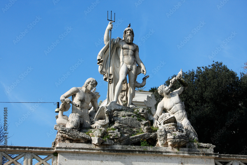 Statues on the Piazza del Popolo (People's Square) named after the church of Santa Maria del Popolo in Rome, Italy