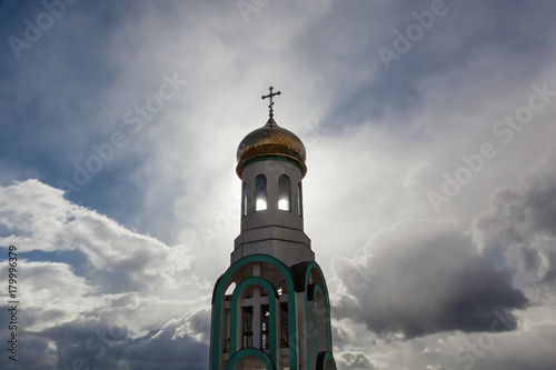 Orthodox church with golden domes in autumn sunny day, Church of All Saints in Carpaty