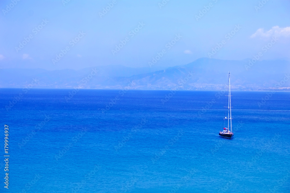 Sailing. Ship yachts with white sails in the open Sea.