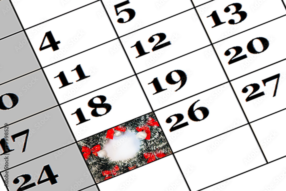 Date of Christmas December 25 is marked on the calendars with a New Year's card Date of Christmas December 25 is marked on the calendars with a New Year's card