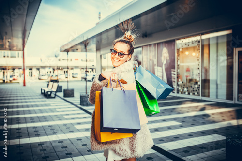  Happy woman hold shopping bag