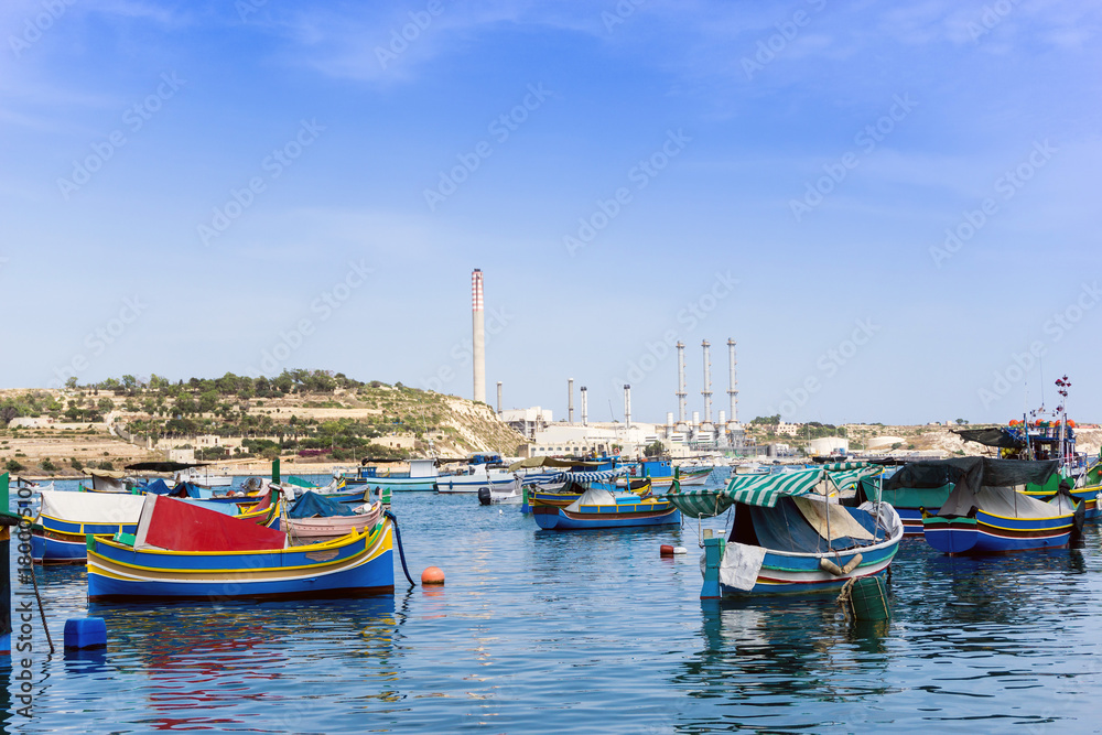 Traditional boats at Marsaxlokk Harbor in Malta