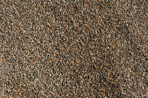 Small and big sand, gravel and pebbles background pattern