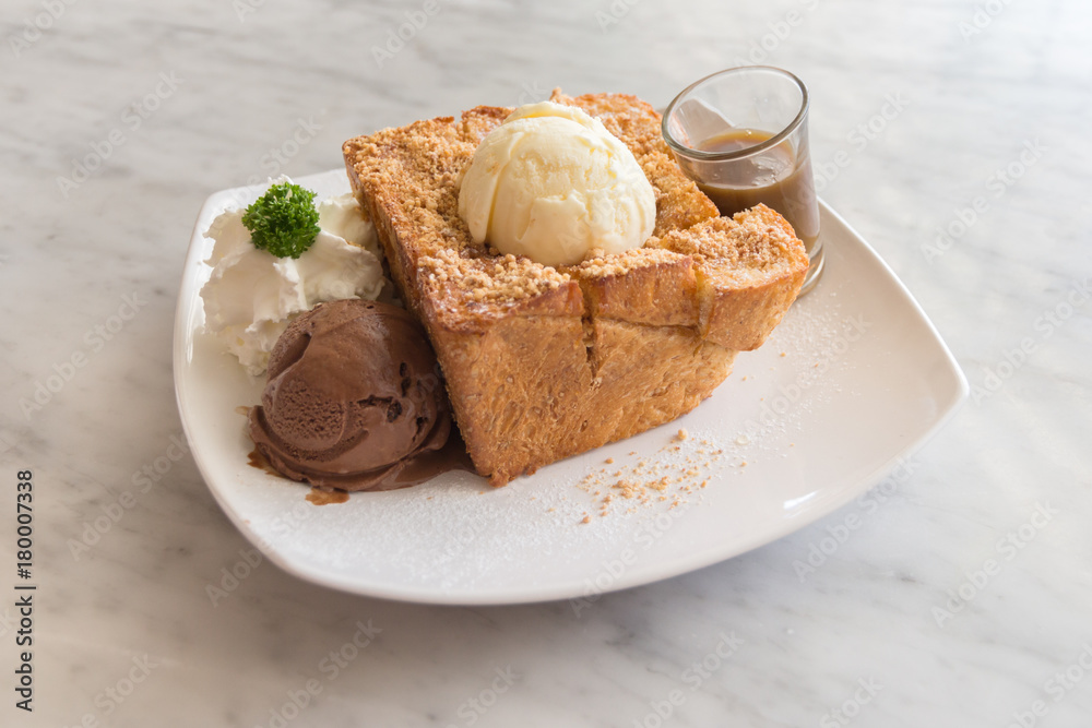 Honey toast with vanilla, chocolate ice-cream and whipped cream. Honey toast with vanilla, chocolate ice-cream and whipped cream.