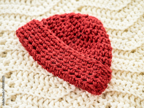 Red Crocheted Baby Cap with Brim Folded Up