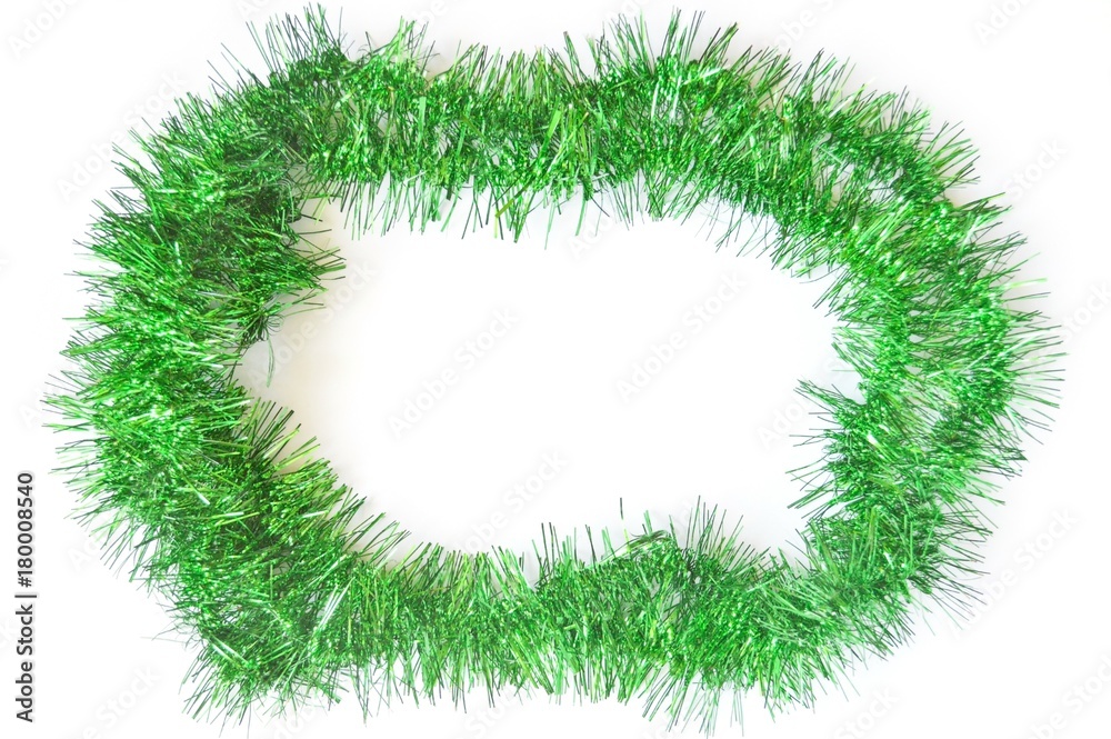 Green shiny tinsel/ Christmas and New Year decoration. Green tinsel, round shape Green shiny tinsel/ Christmas and New Year decoration. Green tinsel, round shape