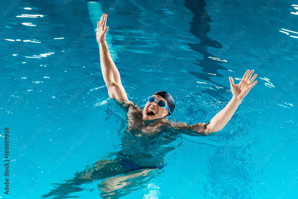 excited swimmer in goggles
