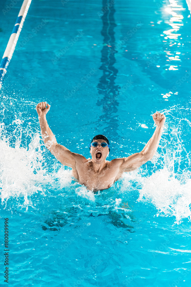 excited swimmer in pool