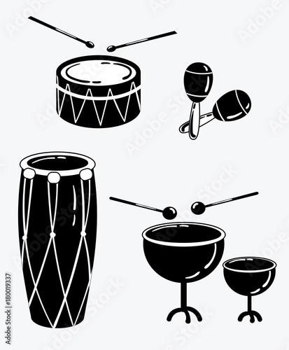 A set of percussion musical instruments. Collection of musical drums. Stylized musical instruments. Black and white vector illustration. Orchestra.