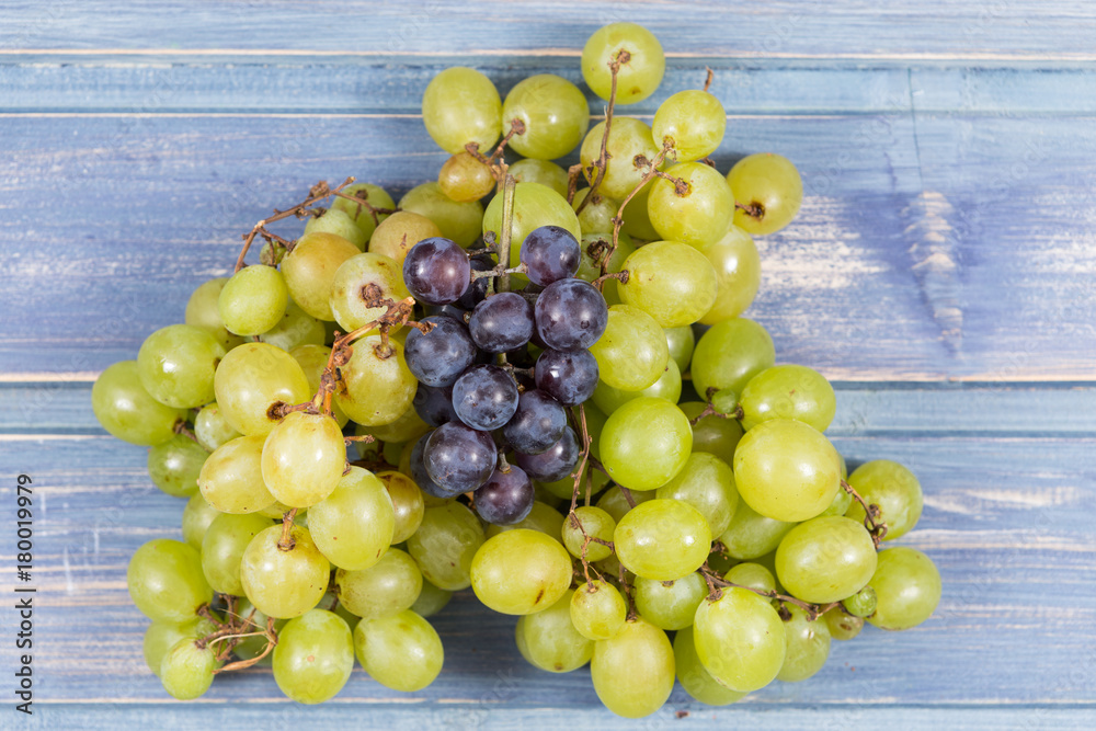 Fresh organic natural farm grapes on wooden background Fresh organic natural farm grapes on wooden background