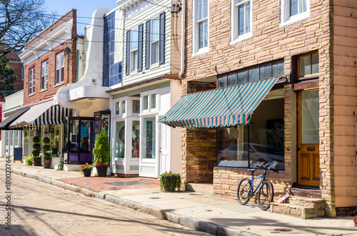 Traditional American Stores along a Cobblestone Street photo