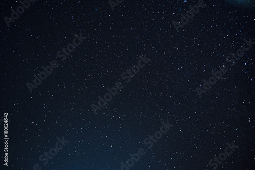 Night scape with beautiful stary sky at the high mountain. Star texture. Space background. photo