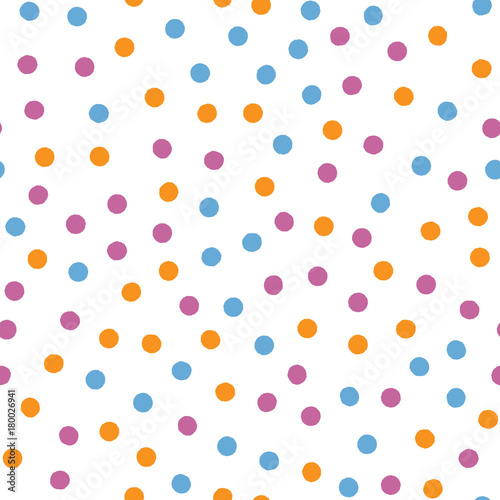 Bright seamless pattern with round dots drawn by hand with rough brush.