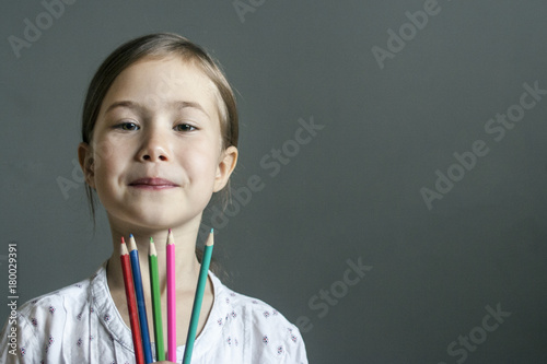 Fényképezés An assiduous student of the art school with colored pencils in hand