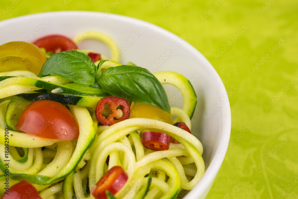 vegetarian zucchini noodles with cherry tomatoes and pepper