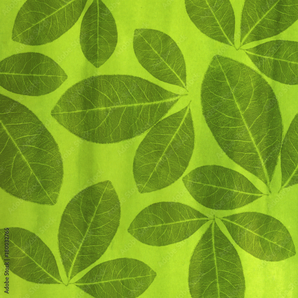 Artistic green background with pencil-shaped leaves
