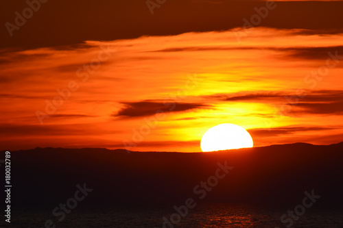 Fototapeta Naklejka Na Ścianę i Meble -  solar disk at sunset