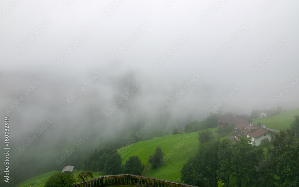 Fototapeta premium Misty morning at sunrise, Country side, Fugen, Alps, Tyrol, Austria, Europe