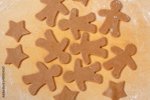 Cooking and decorating christmas gingerbread men. Background.