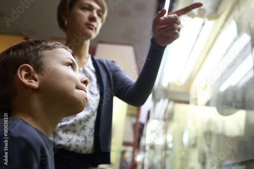 Woman with kid in museum