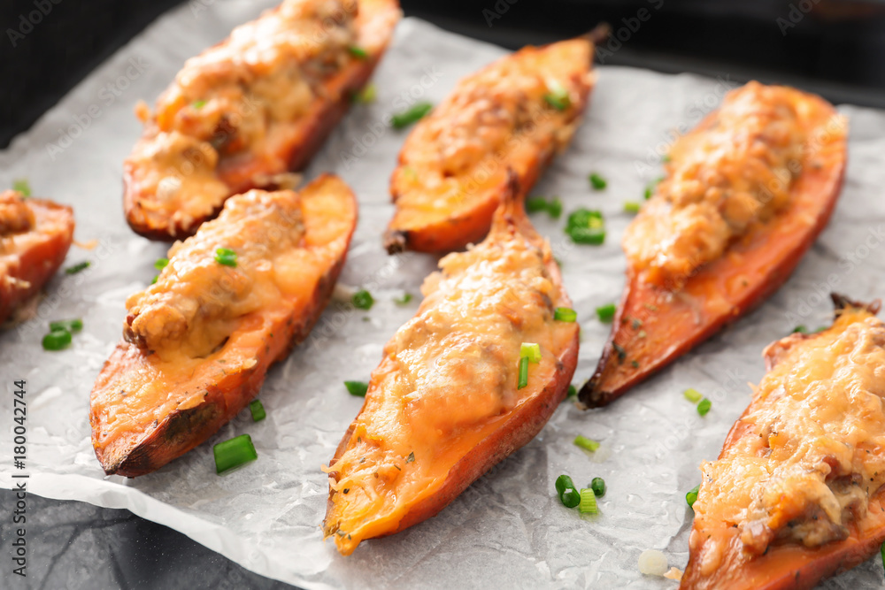 Yummy stuffed sweet potato on kitchen table Yummy stuffed sweet potato on kitchen table