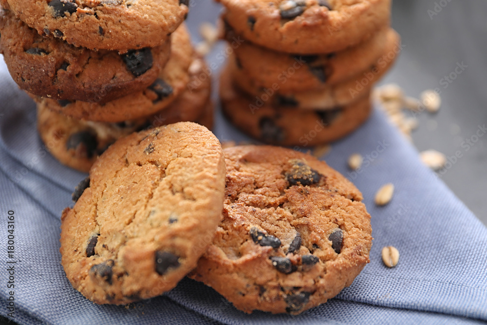 Tasty oatmeal cookies on table, closeup
