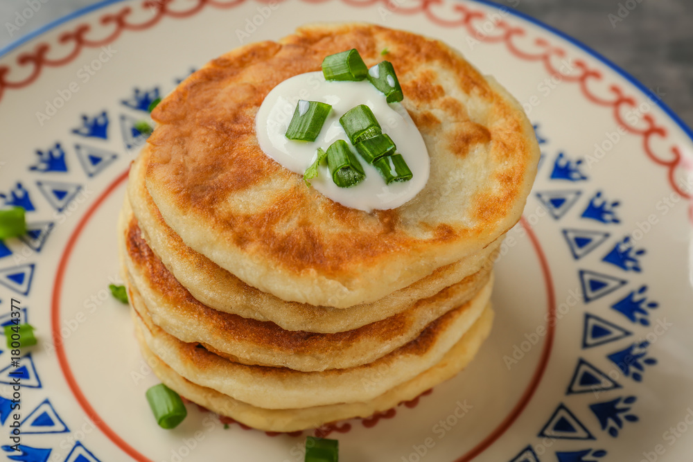 Plate with Hanukkah potato pancakes, closeup Plate with Hanukkah potato pancakes, closeup
