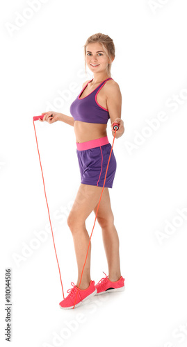 Sporty young woman with jum...