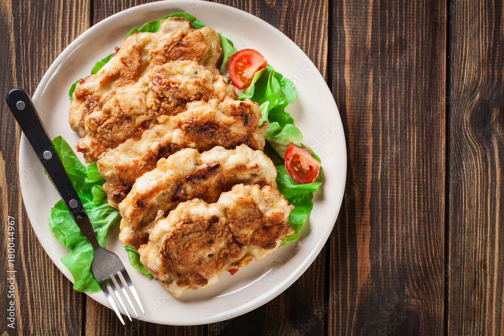 Chicken Medallion with red pepper portions Chicken Medallion with red pepper portions