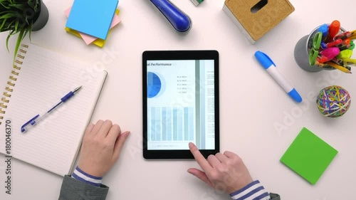 Top View Overhead Of Businesswoman Reading Business Plan On Digital Table