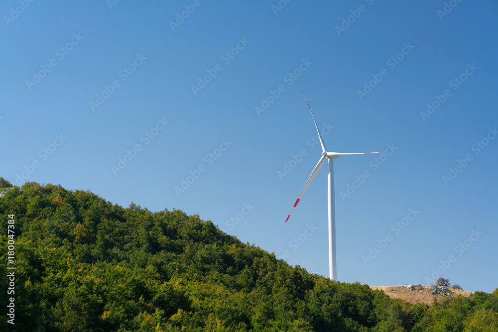 Windmills converting wind energy into electricity Windmills converting wind energy into electricity