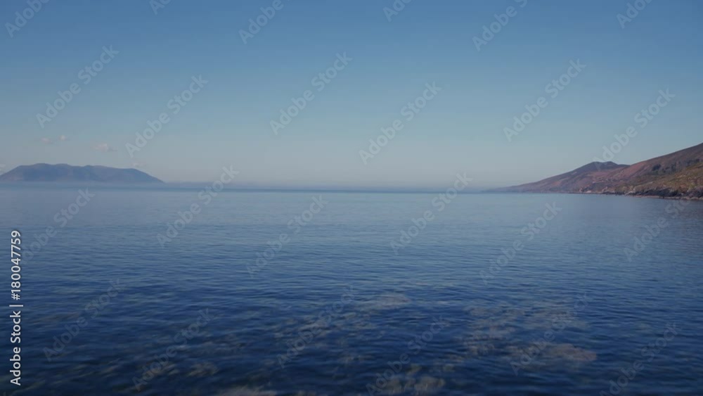 Aerial Drone Wide Shot Of Seascape Against Blue Sky Aerial Drone Wide Shot Of Seascape Against Blue Sky