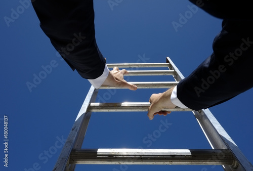 Climbing the corporate ladder business concept