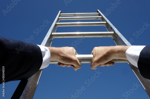 Tableau sur toile Climbing the corporate ladder business concept