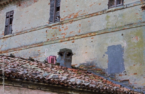 Hidden pink window behind the chimney (Pesaro, Italy) © Tommaso