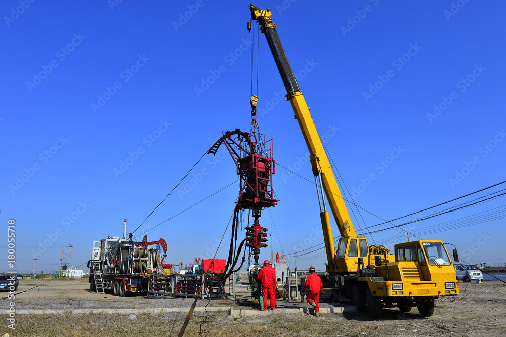 field oil workers at work