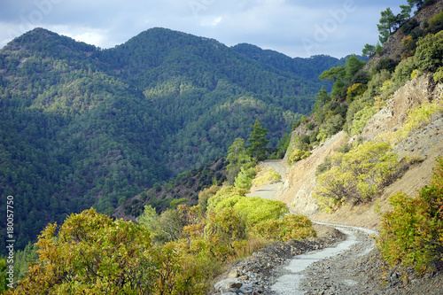 Dirt road and mountain © Valery Shanin