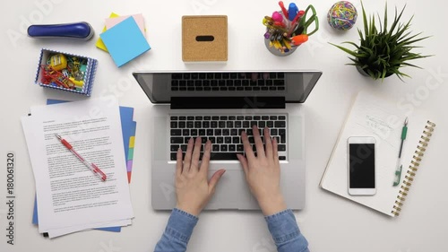 Top View Overhead Shot Of Businesswoman Using Laptop At Desk