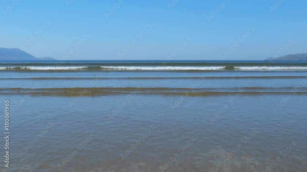 Beautiful Shot Of Sea Waves Reaching Shore On Beach Beautiful Shot Of Sea Waves Reaching Shore On Beach