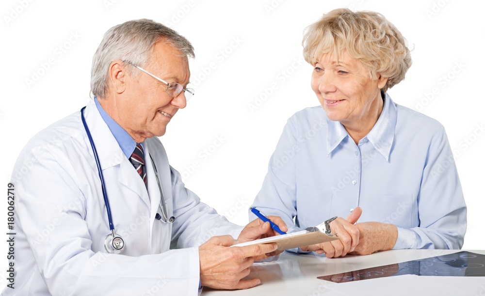 Portrait of a Mature Doctor with Patient Portrait of a Mature Doctor with Patient