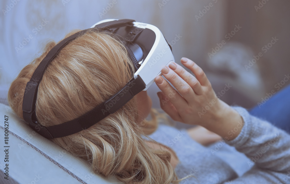 Naklejka premium Woman wearing Virtual reality headset