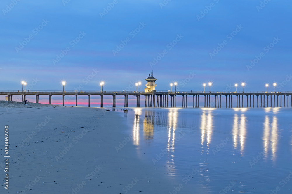 Beach pier early morning sunrise