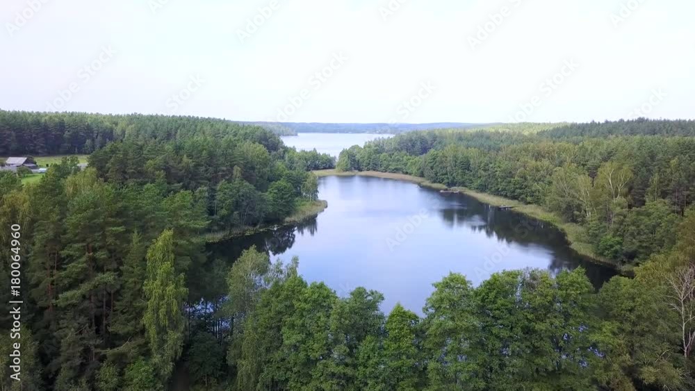Lakes is surrounded by forests from the height of bird flight. Aerial survey Lakes is surrounded by forests from the height of bird flight. Aerial survey