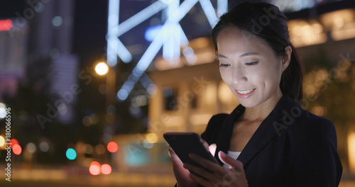Canvas Print Businesswoman use of mobile phone