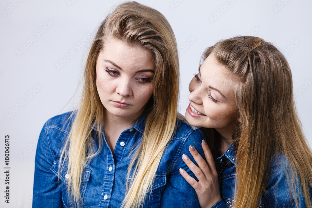 Woman being sad her friend comforting her Woman being sad her friend comforting her